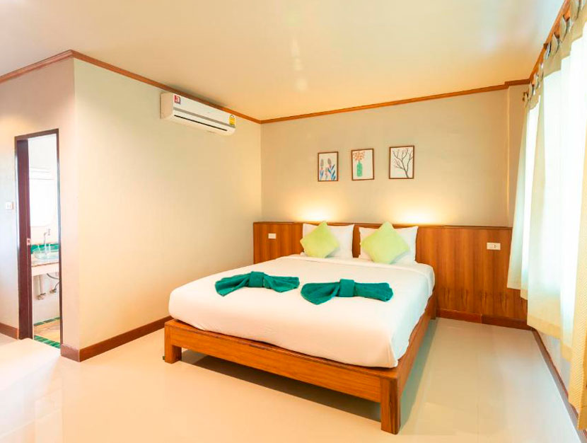 Habitación con cama doble de Medio de Pai Hotel, una opción donde dormir en Pai